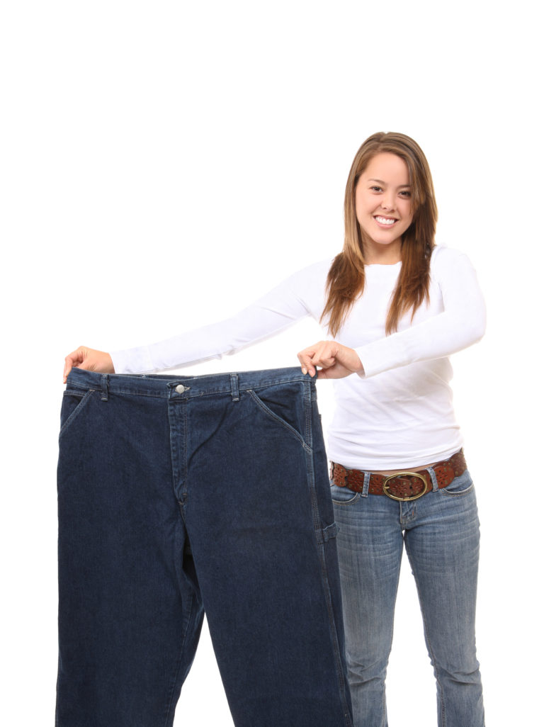 Pretty Woman on Diet Showing Weight Loss