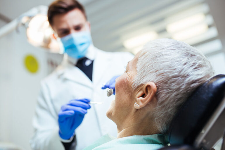 Beautiful senior woman having a dental treatment