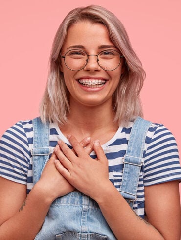Happy teen with braces
