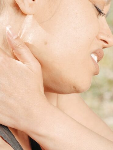 Photo by Kindel Media: https://www.pexels.com/photo/close-up-photo-of-woman-having-a-neck-pain-7298628/