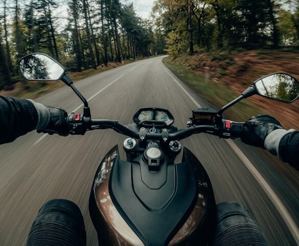 https://unsplash.com/photos/black-and-gray-motorcycle-on-road-during-daytime-CRmcBeINxtg